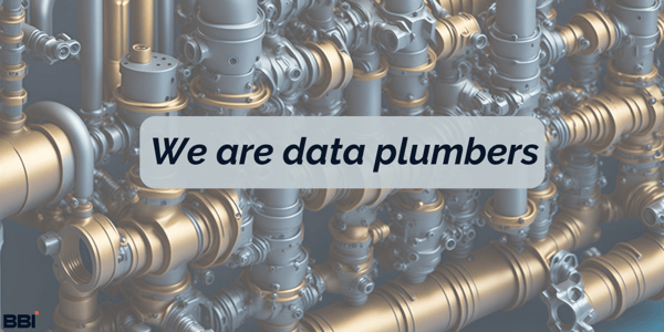 picture of pipes with the text We are data plumbers